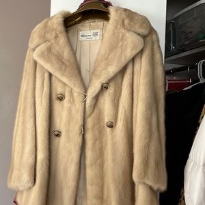 Fur coat- good condition. Does have my mom’s name engraved inside the coat.